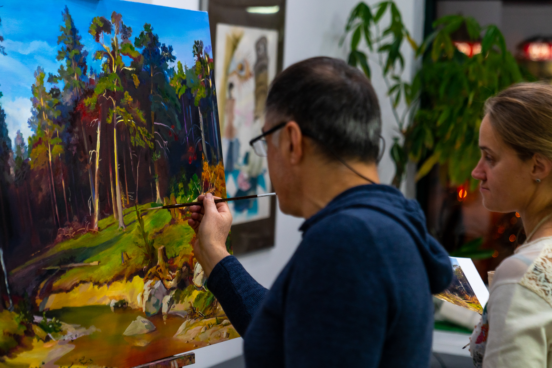 People painting during an art night